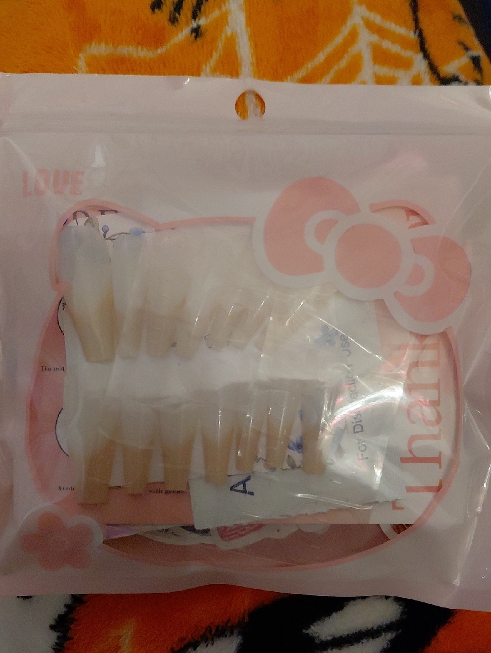 Hello Kitty Nude & White Faux Nail Set with Pink Bow Accent